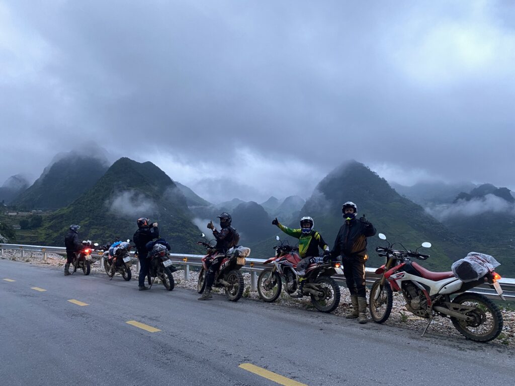 Riding through Ma Pi Leng Pass on a cloudy day